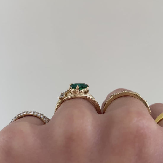 caption:Shown with 8x5mm pear emerald in 14k yellow gold