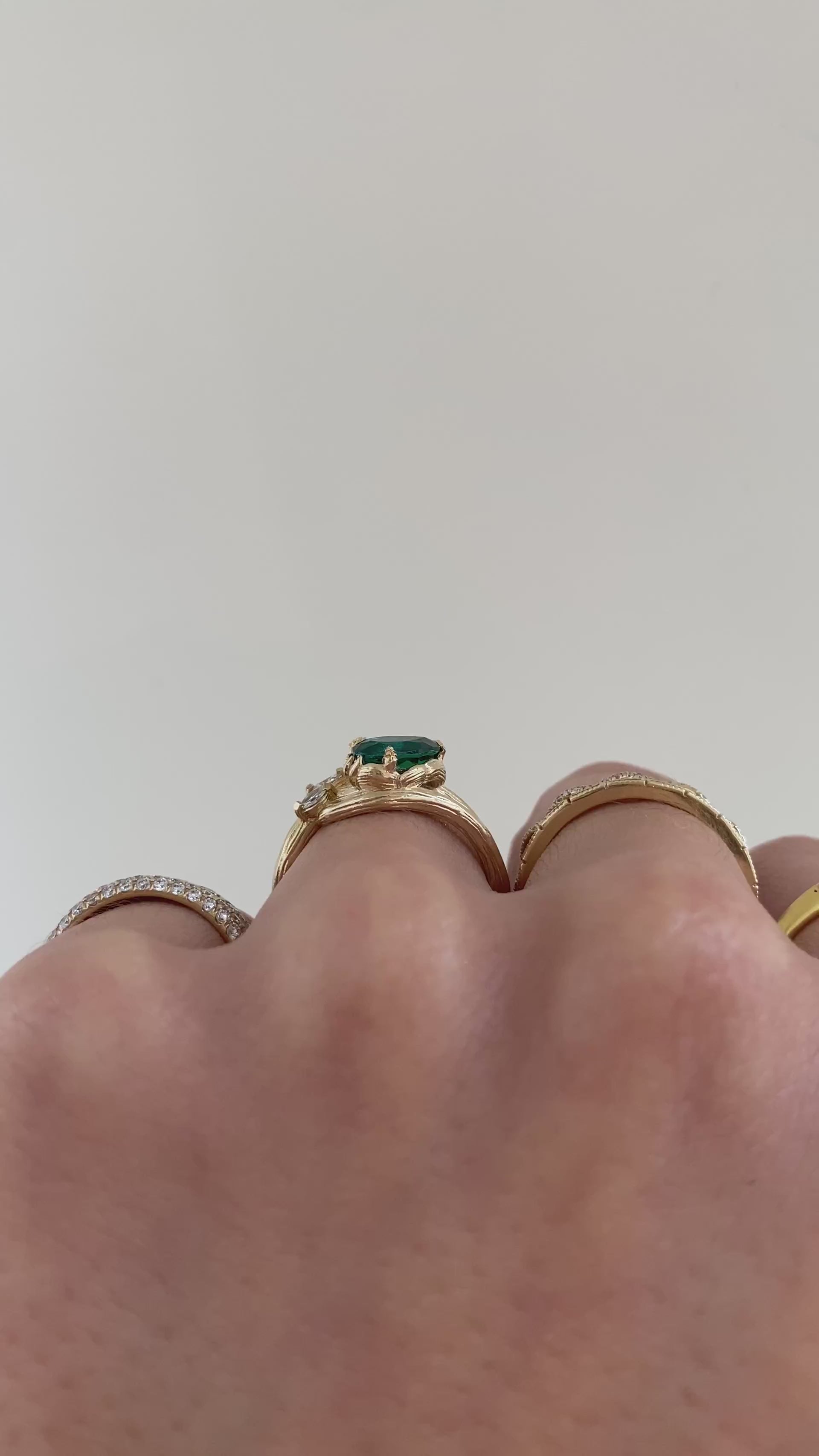 caption:Shown with 8x5mm pear emerald in 14k yellow gold