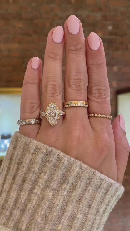 caption:Shown with 3.5ct marquise in 14k yellow gold 