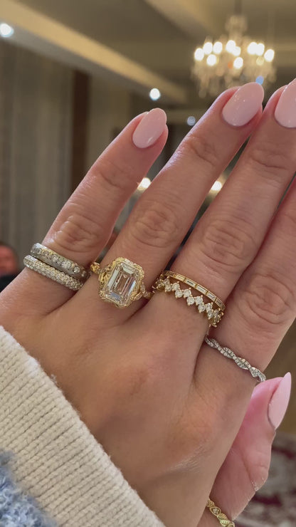 caption:Shown with 3ct emerald cut in 14k yellow gold 