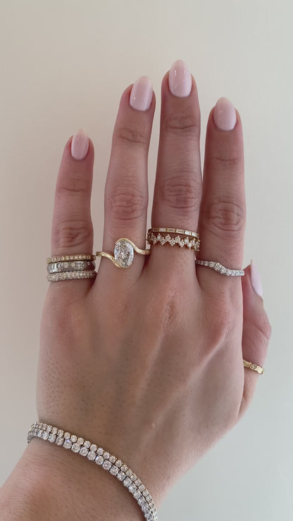 caption:Shown with a 1.7ct oval in 14k yellow gold