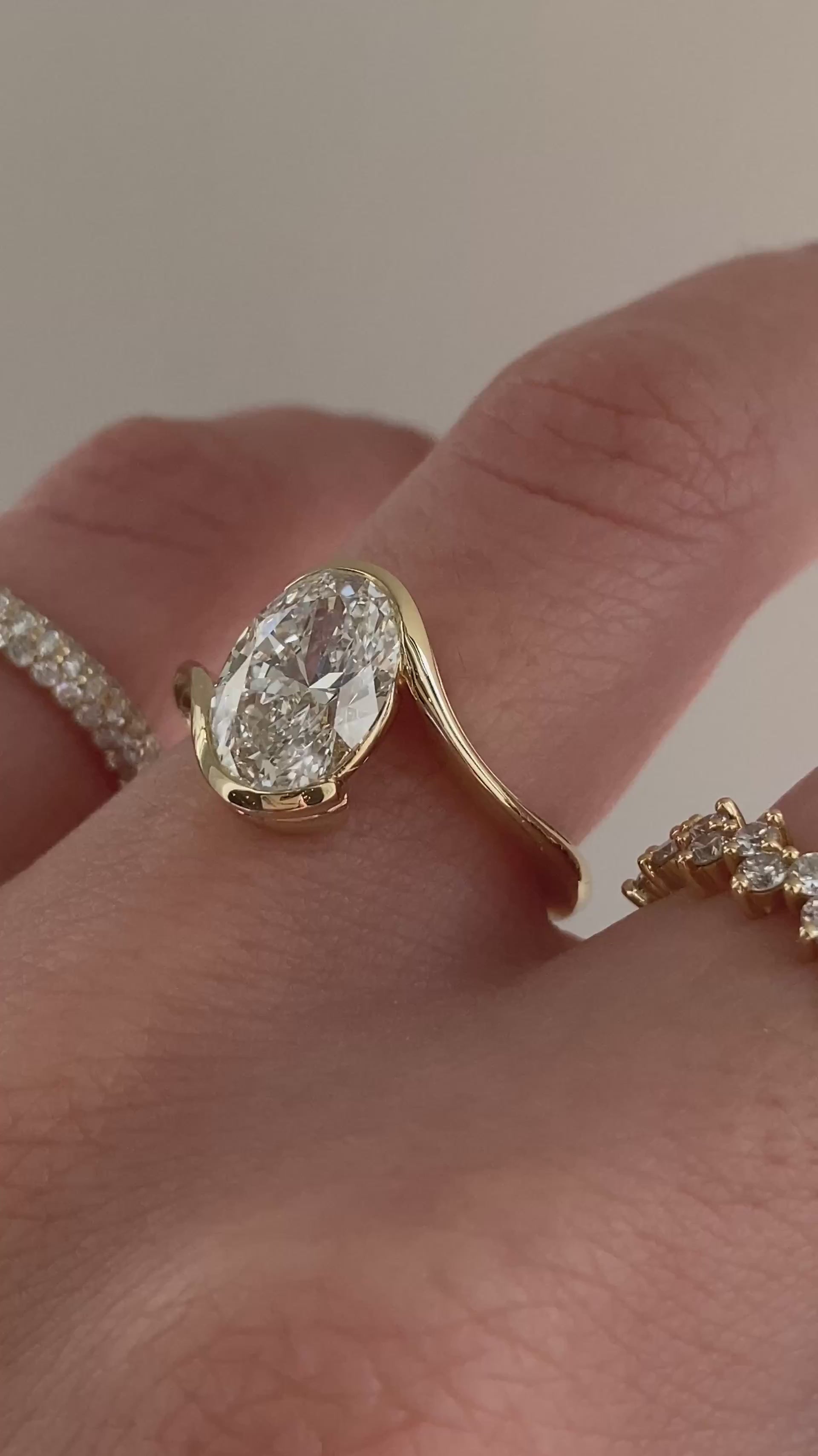 caption:Shown with 2ct oval in 14k yellow gold c