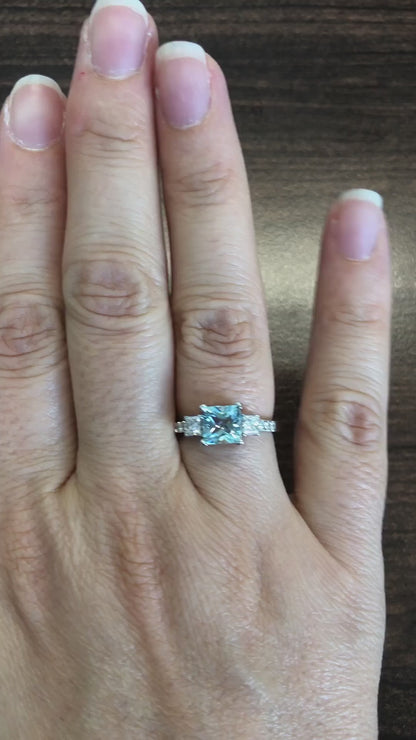 caption:Shown with princess cut aquamarine in platinum