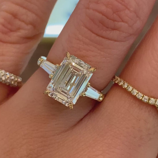 caption:Shown with 3ct emerald cut diamond in 14k yellow gold