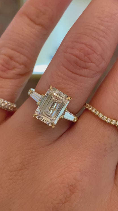 caption:Shown with 3ct emerald cut diamond in 14k yellow gold