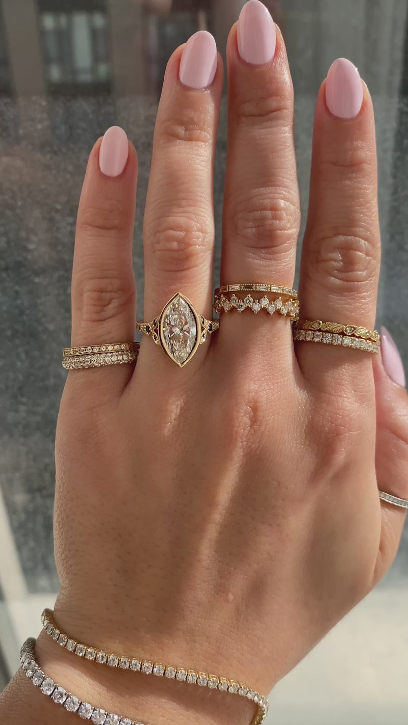 caption:Shown with 3ct marquise diamond in 14k yellow gold