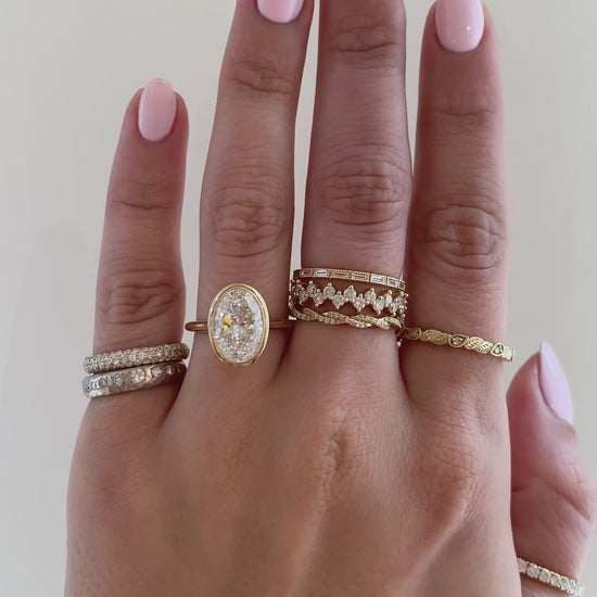 caption:Shown with 3ct oval in 14k yellow gold