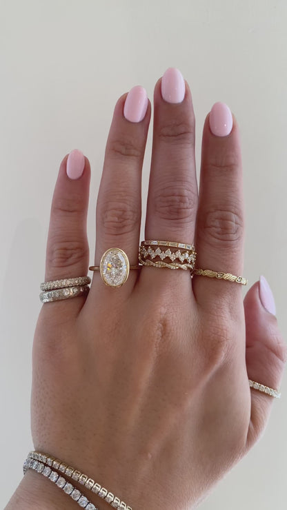 caption:Shown with 3ct oval in 14k yellow gold