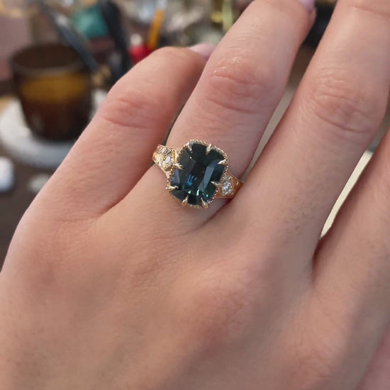 caption:Shown with 4.6ct cushion sapphire in 14k yellow gold