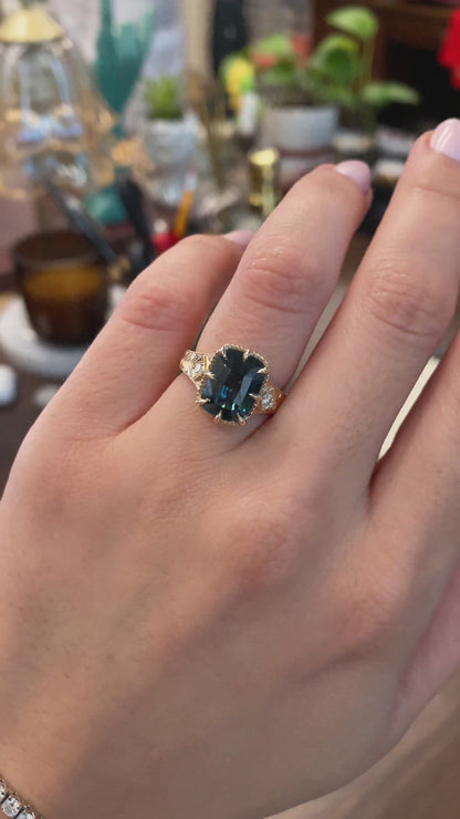 caption:Shown with 4.6ct cushion sapphire in 14k yellow gold