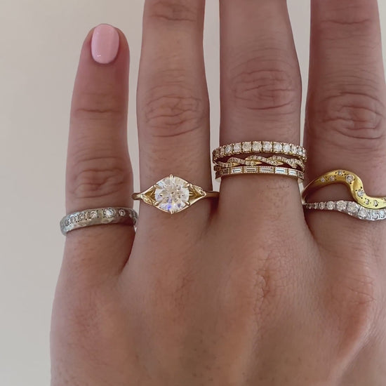 caption:Shown with 1.2ct round in 14k yellow gold