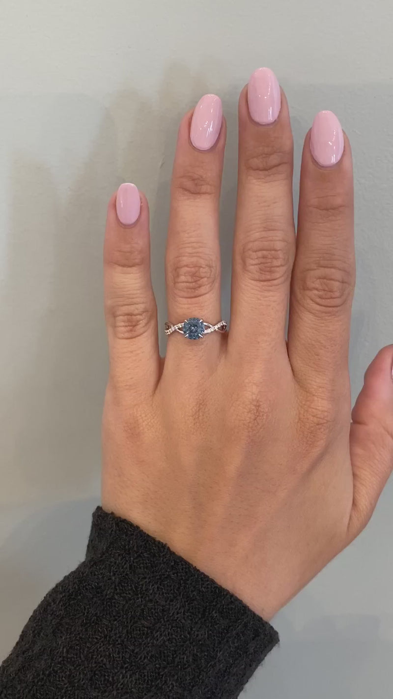 caption:Shown with 1ct round sapphire in platinum