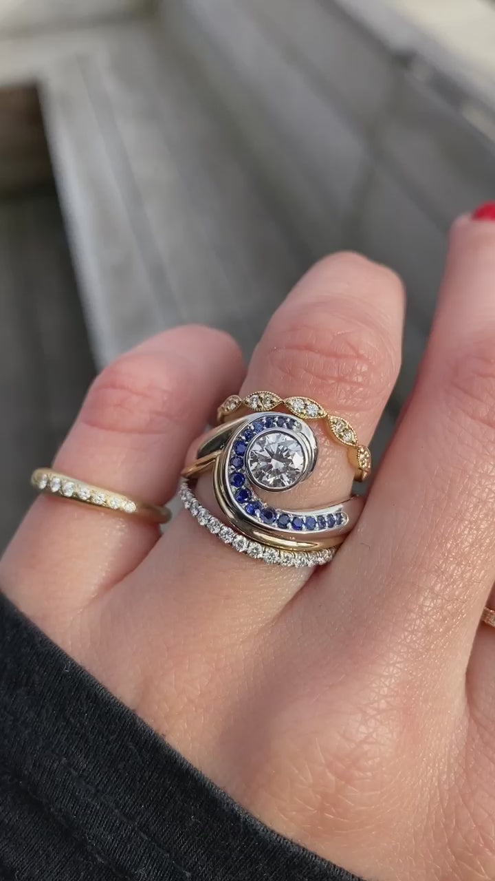 caption:Stacked with Natali & Bella wedding bands
