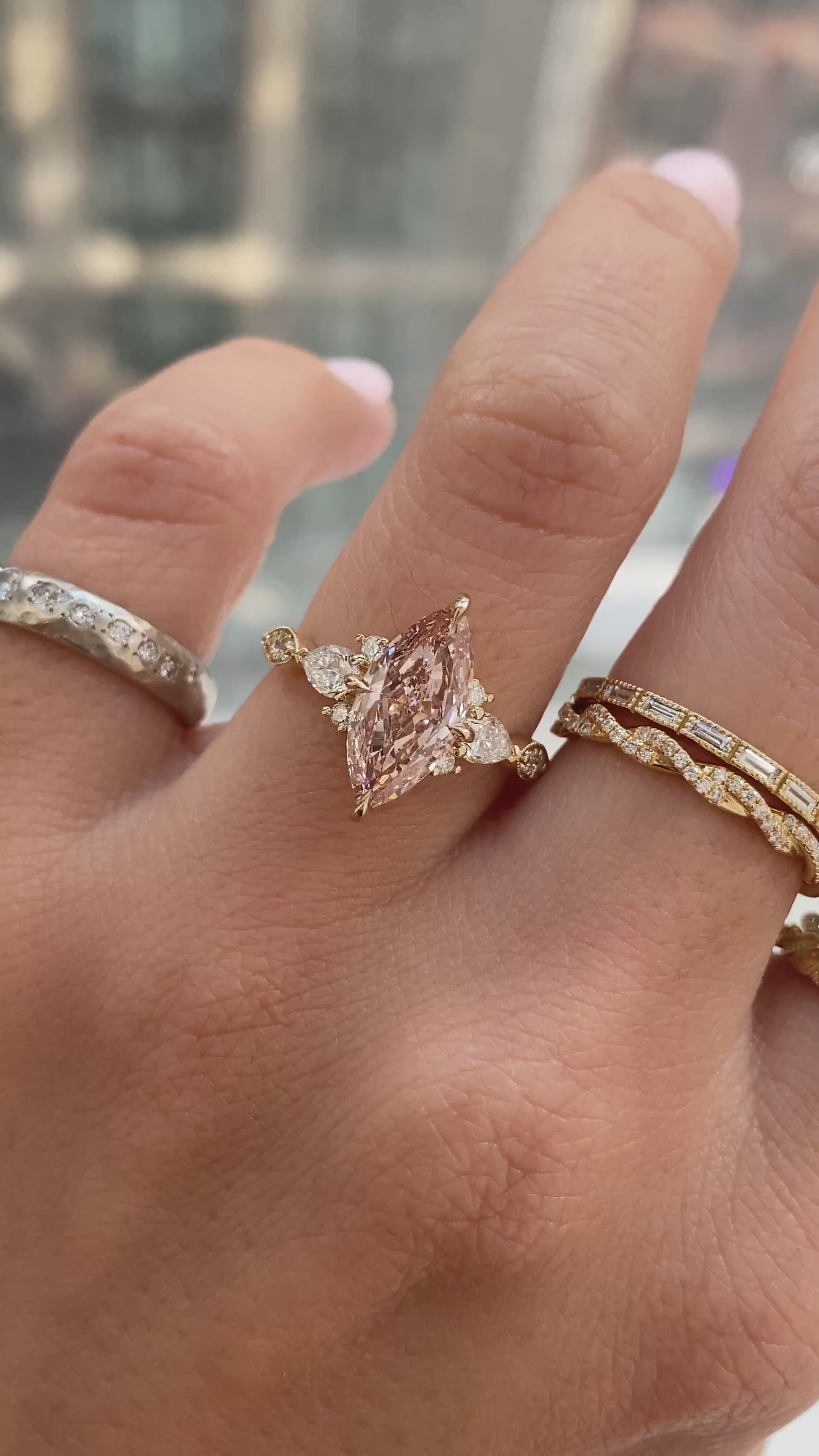 caption:Shown with 2ct fancy pink marquise in 14k yellow gold