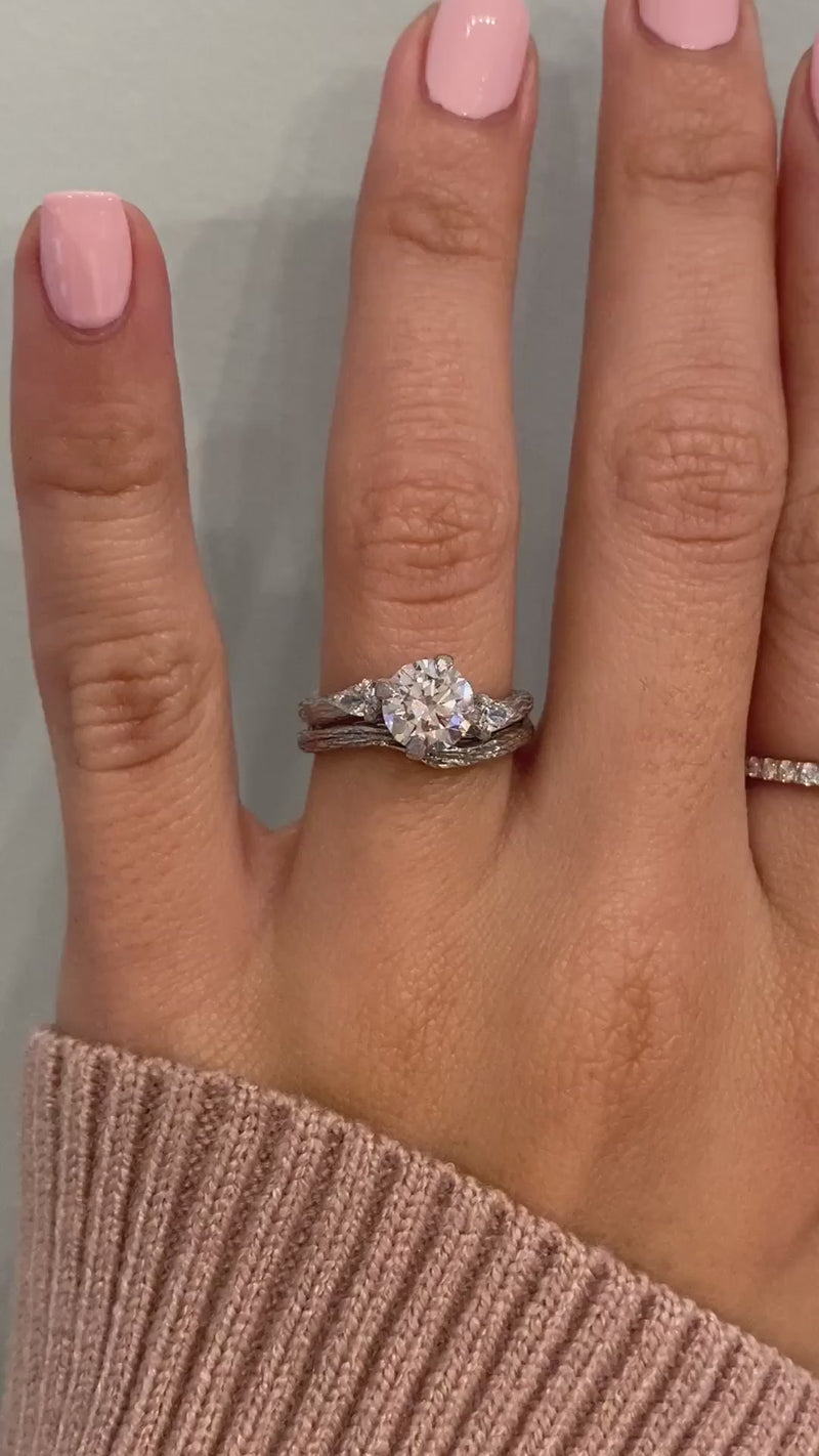 caption:Shown with 1.25ct round diamond & Autumn wedding band in platinum