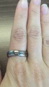 caption:Shown in oxidized silver