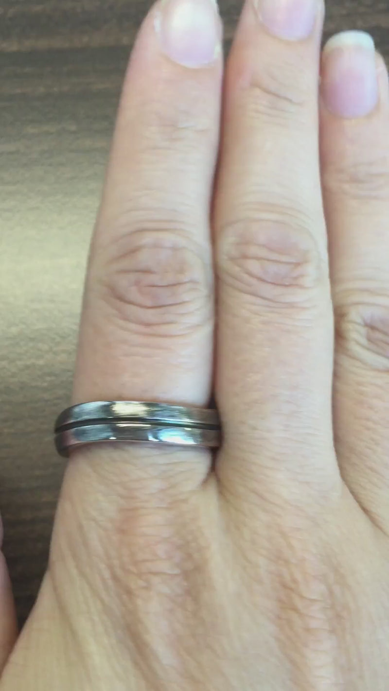 caption:Shown in oxidized silver