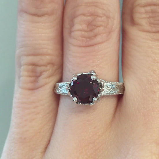 caption:Shown with 2ct ruby in platinum