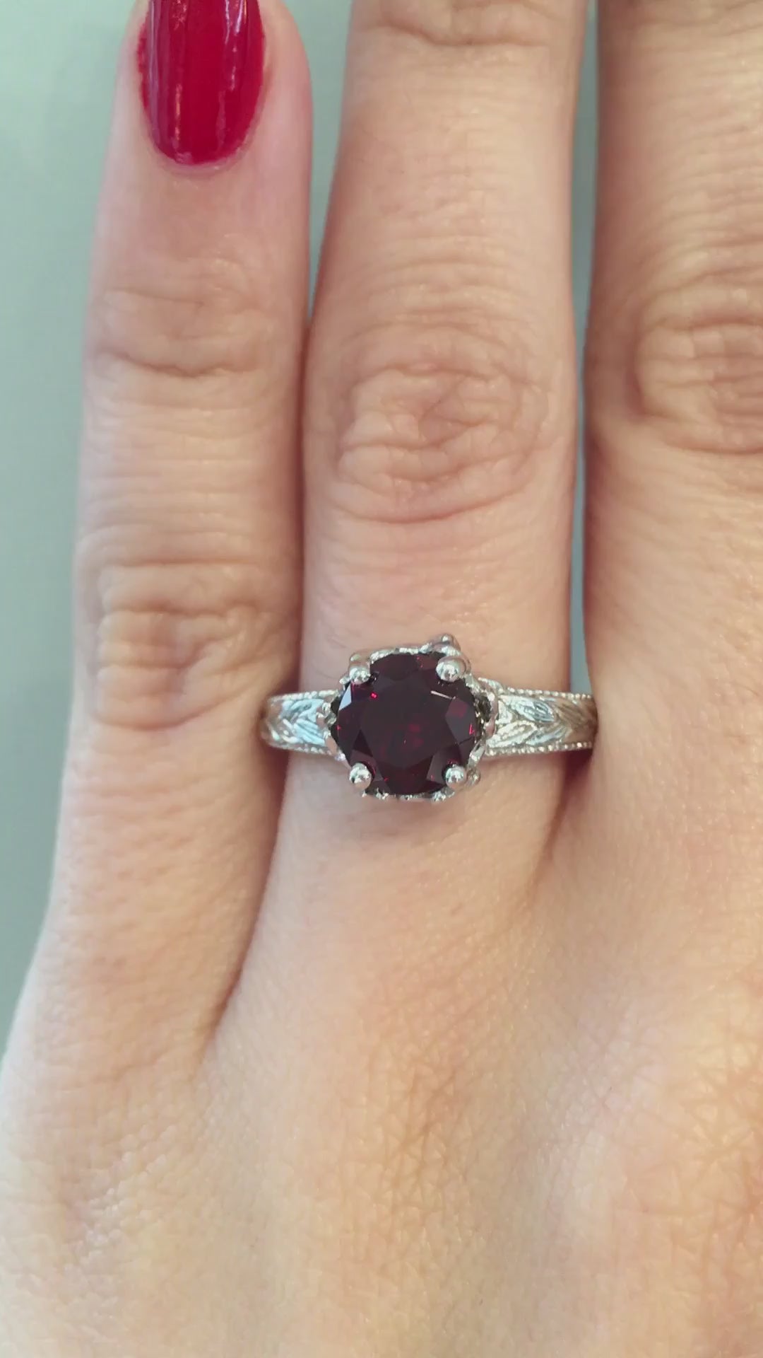 caption:Shown with 2ct ruby in platinum