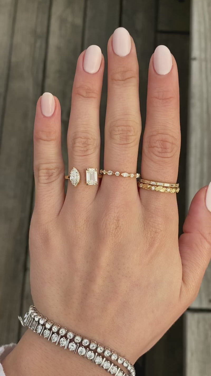 caption:Shown with 1.50ct emerald cut & 0.75ct marquise diamonds in 14k yellow gold