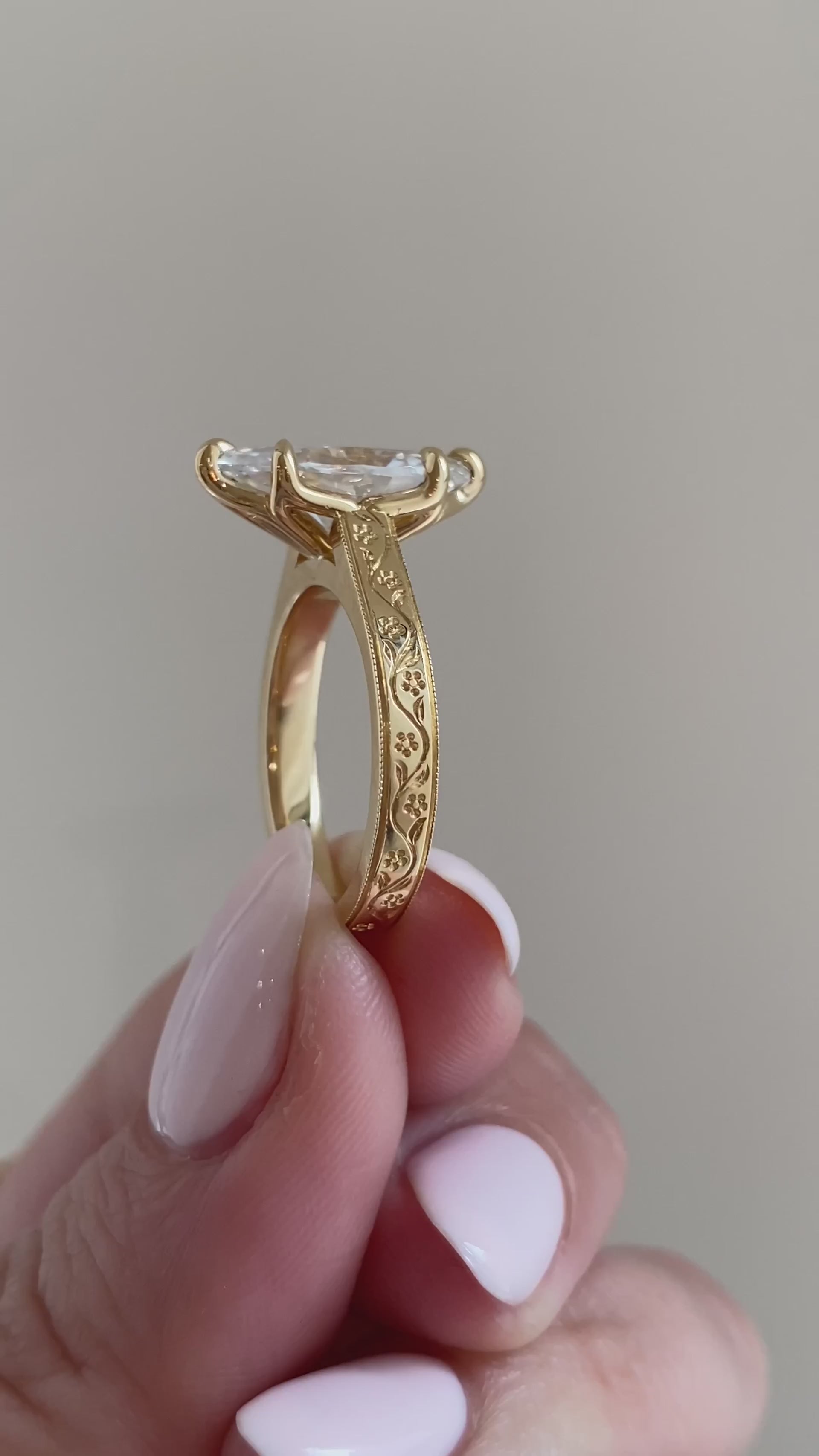 caption:Shown with 2.7ct marquise in 18k yellow gold 