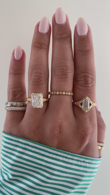 caption:Shown with 3ct radiant cut in 18k yellow gold 