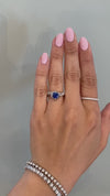 caption:Shown with round blue sapphire in  platinum