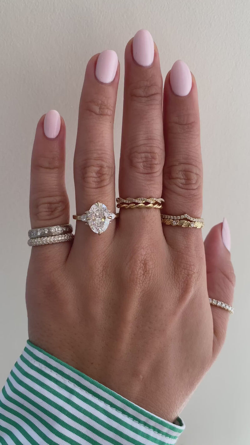 caption:Shown with 3ct oval diamond in 14k yellow gold