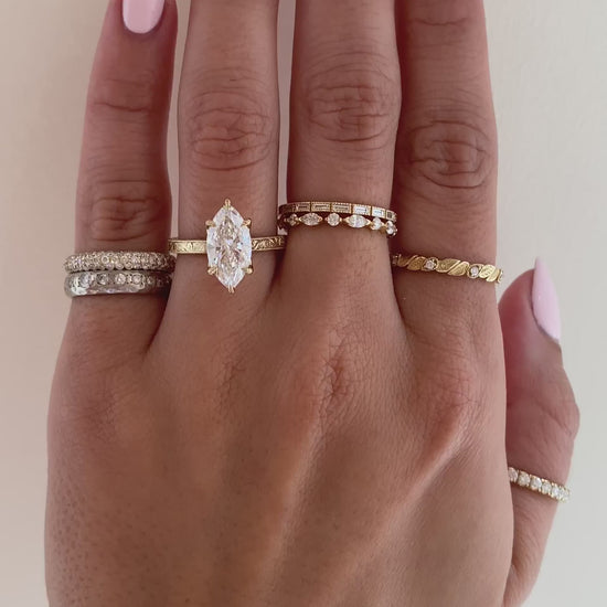 caption:Shown with 2.25ct marquise in 14k yellow gold