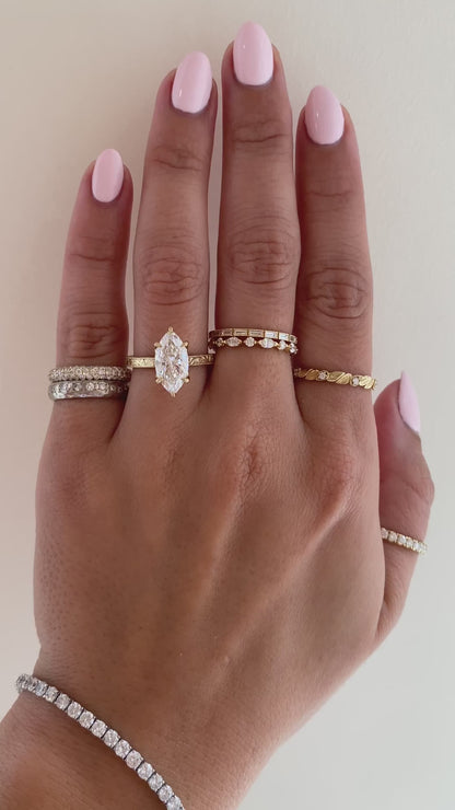 caption:Shown with 2.25ct marquise in 14k yellow gold