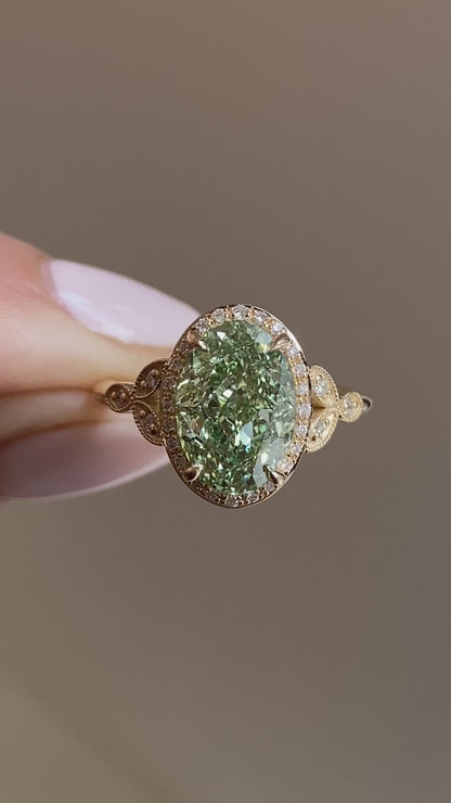 caption:Shown with 3ct fancy green oval in 14k yellow gold 