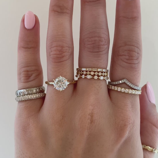 caption: Shown with 1.7ct round in 14k yellow gold
