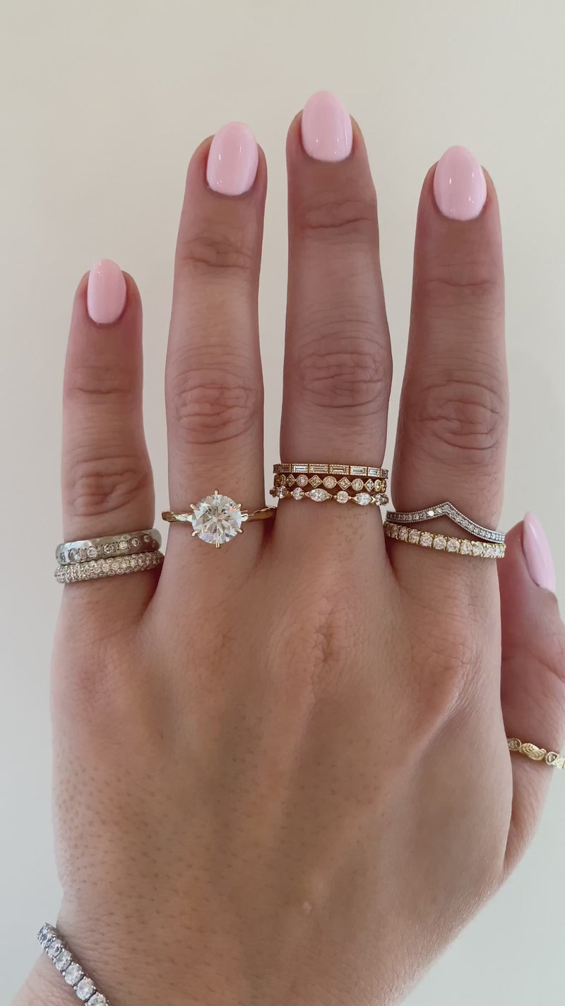 caption: Shown with 1.7ct round in 14k yellow gold