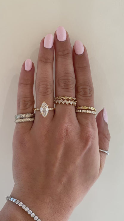 caption:Shown with 2ct marquise diamond in 18k yellow gold