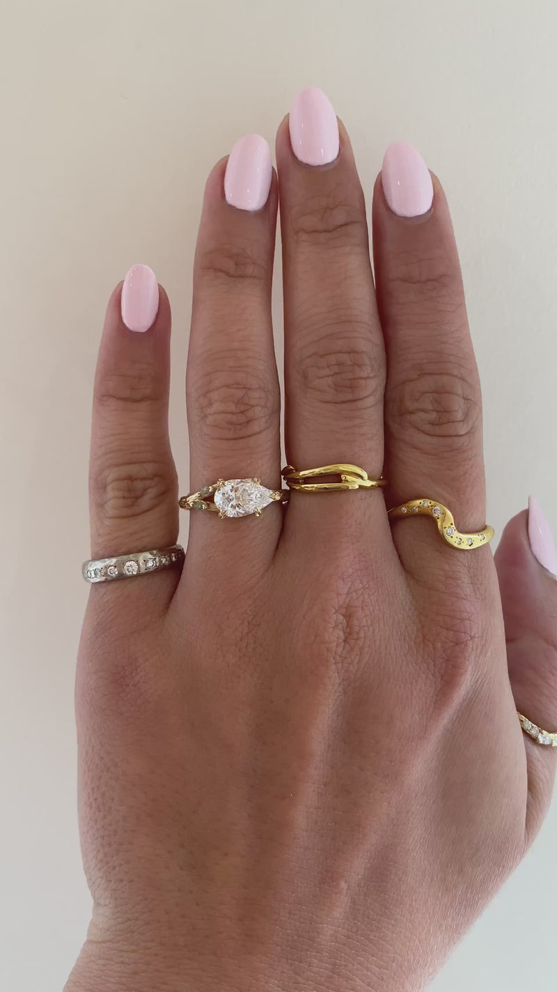 caption:
Shown with 1.2ct pear diamond in 14k yellow gold