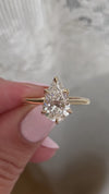 caption:Shown with 2.2ct pear diamond in 14k yellow gold