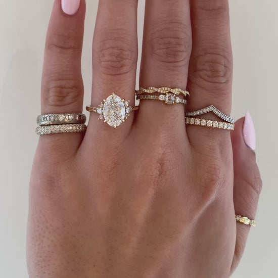 caption:Shown with 2.28ct oval in 14k yellow gold 