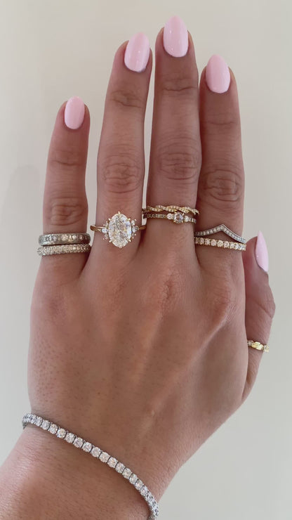 caption:Shown with 2.28ct oval in 14k yellow gold 