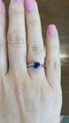 caption:Shown with 1.5ct round blue sapphire in platinum