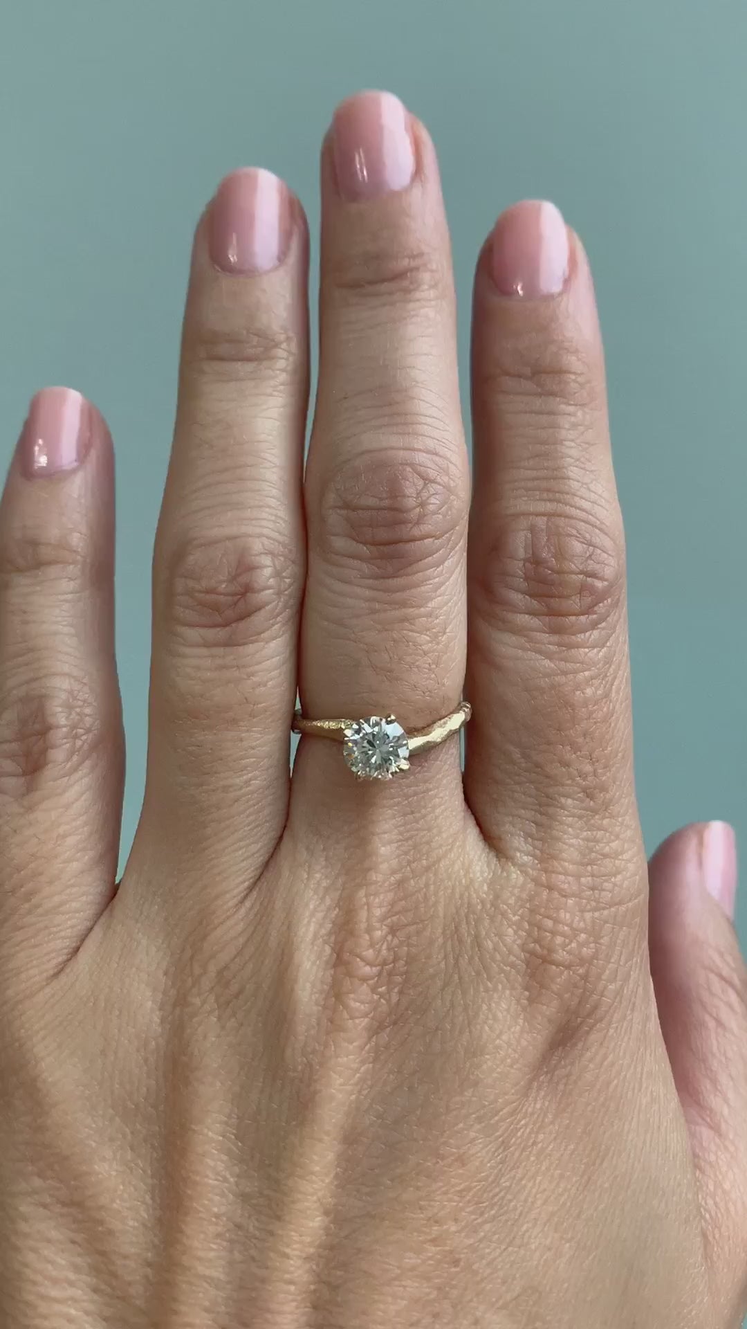 caption:Shown with 1ct round diamond in brushed 14k yellow gold 