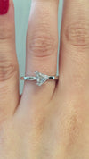 caption:Shown with 0.7ct rough diamond in platinum