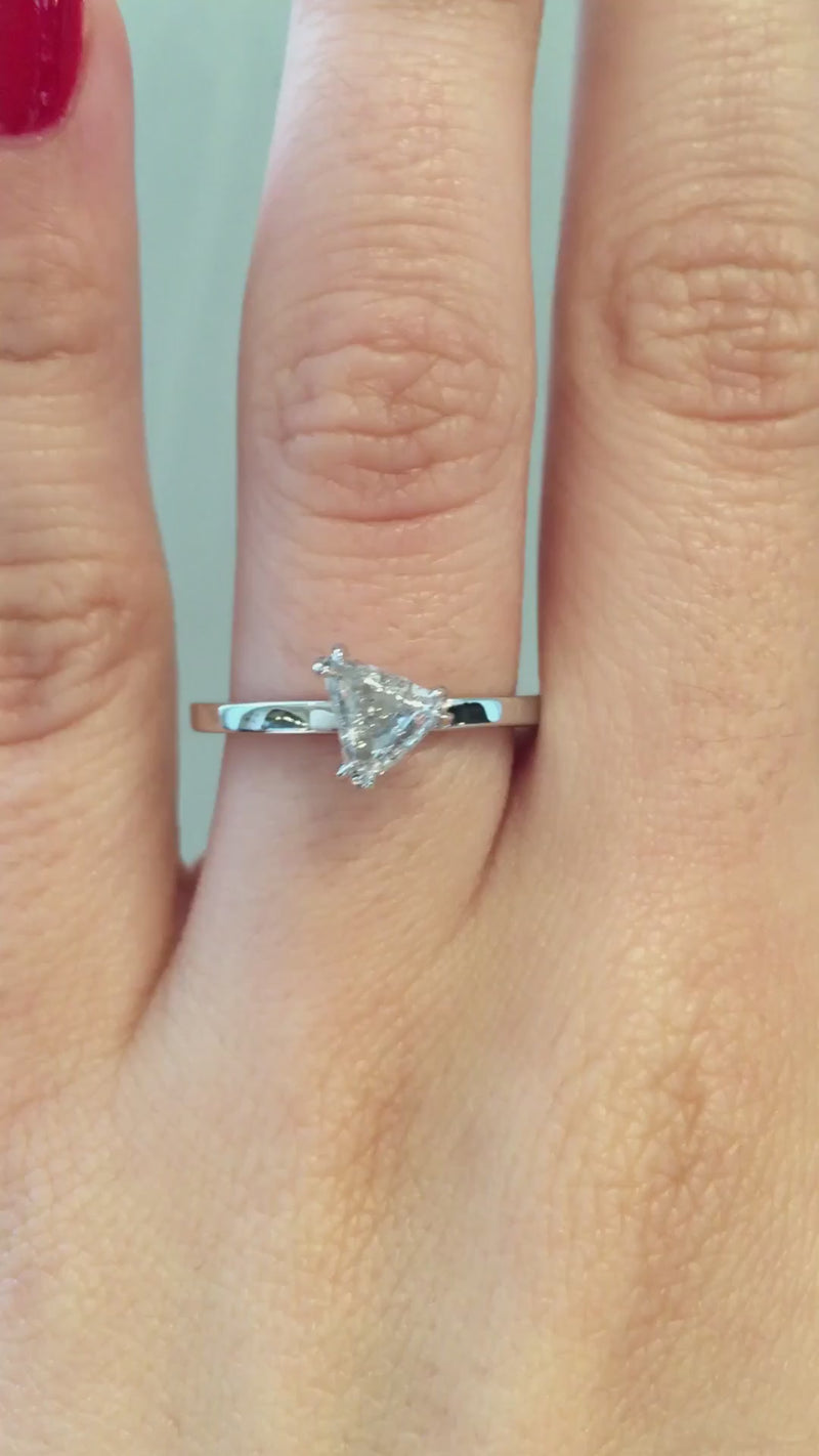 caption:Shown with 0.7ct rough diamond in platinum