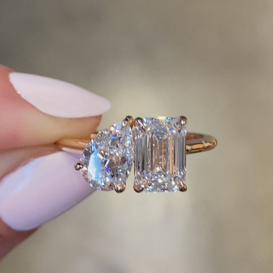 caption:Shown with 0.9ct pear and 1.5ct emerald cut diamond