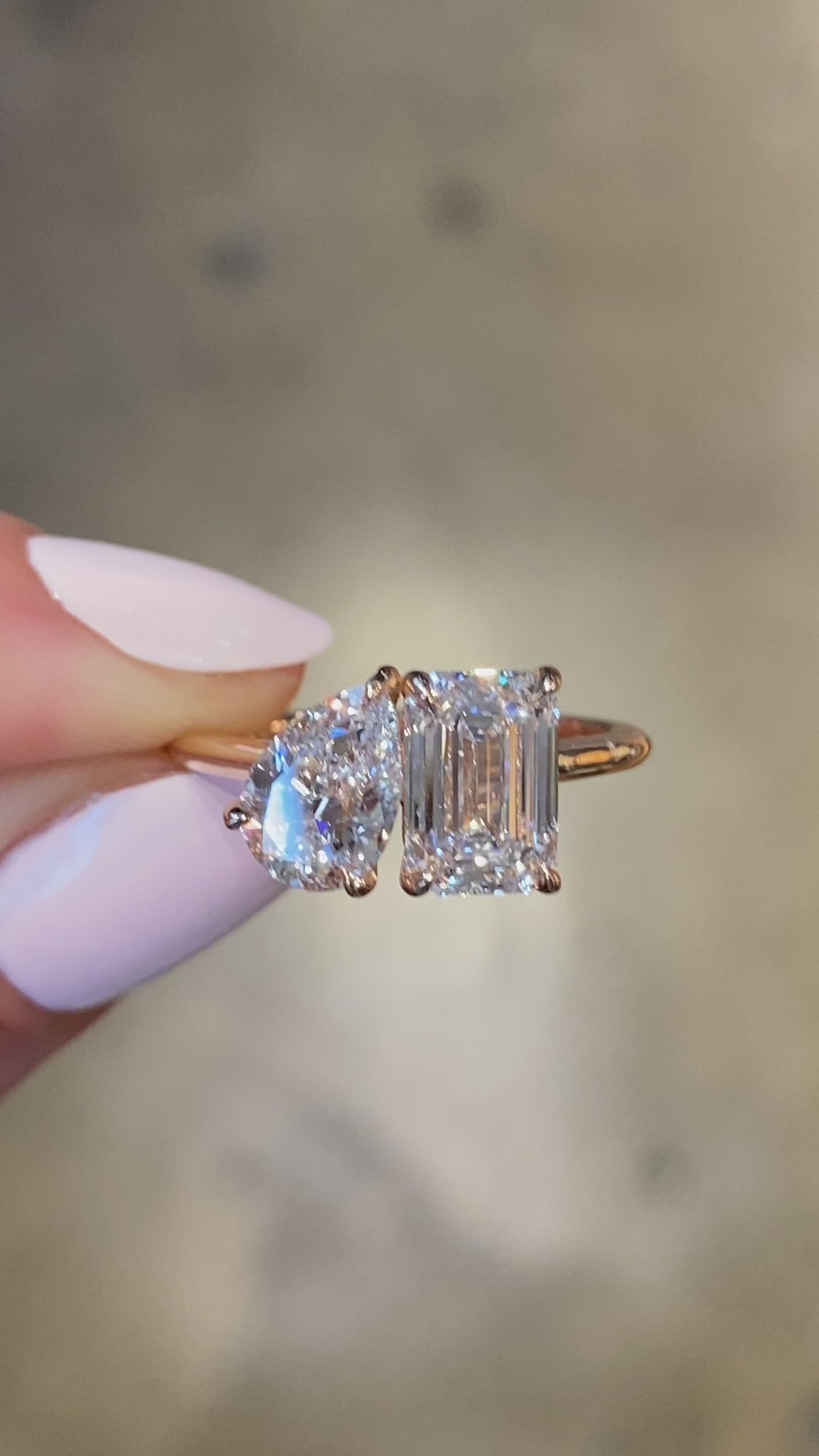 caption:Shown with 0.9ct pear and 1.5ct emerald cut diamond