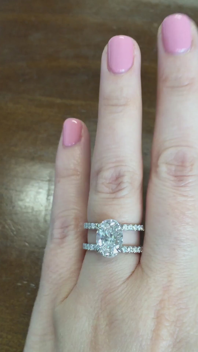 caption:Shown with 3ct oval diamond in platinum