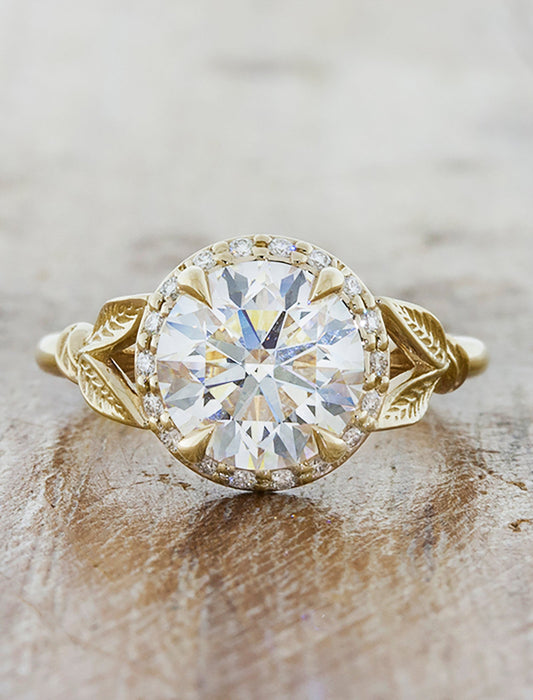 caption:Shown with a 1.5ct round diamond in 14k yellow gold