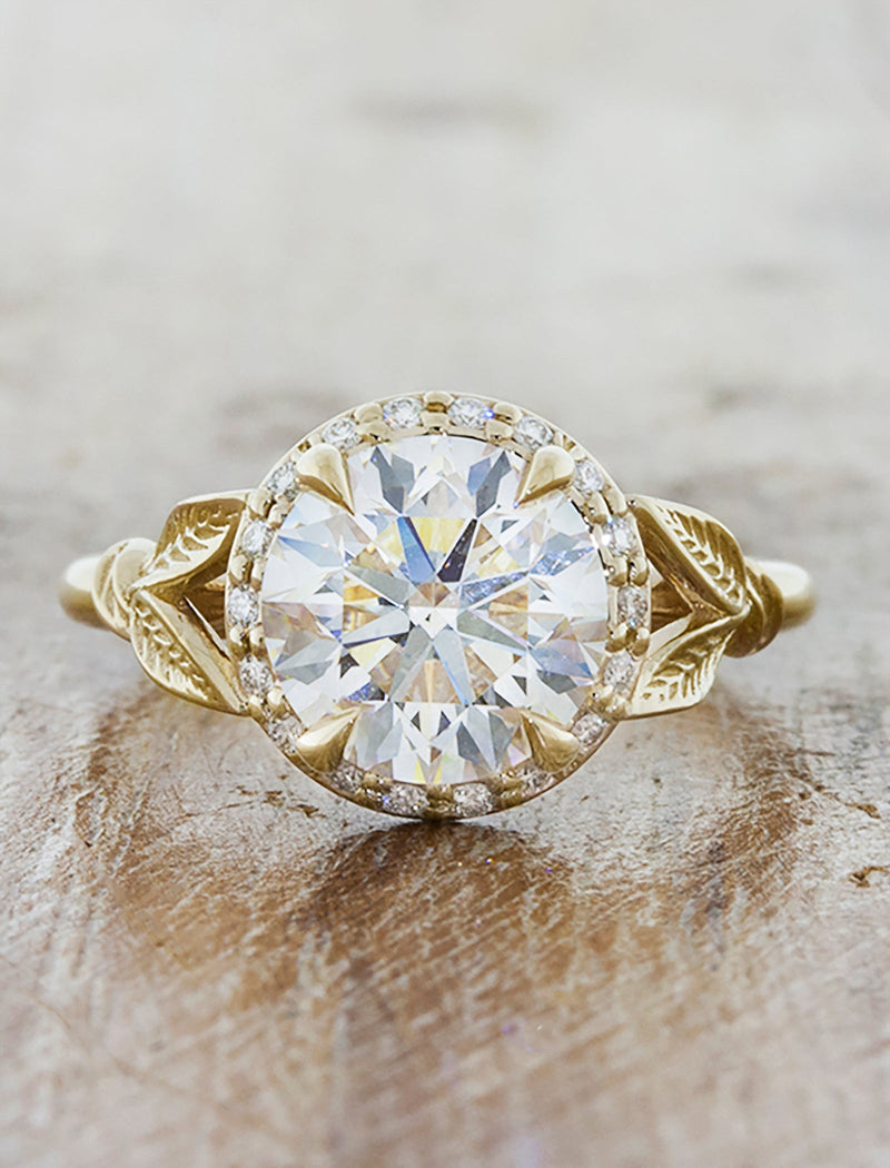 caption:Shown with a 1.5ct round diamond in 14k yellow gold