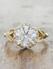Yellow Gold Halo Engagement Ring. caption:Customized with a 1.5ct round center diamond