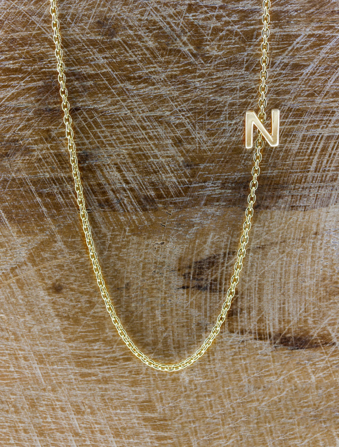 caption:Shown in 14k yellow gold with letter "N"