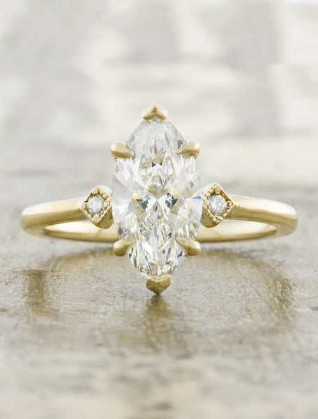 caption:Shown in 14k yellow gold with 1.29ct marquise center diamond option